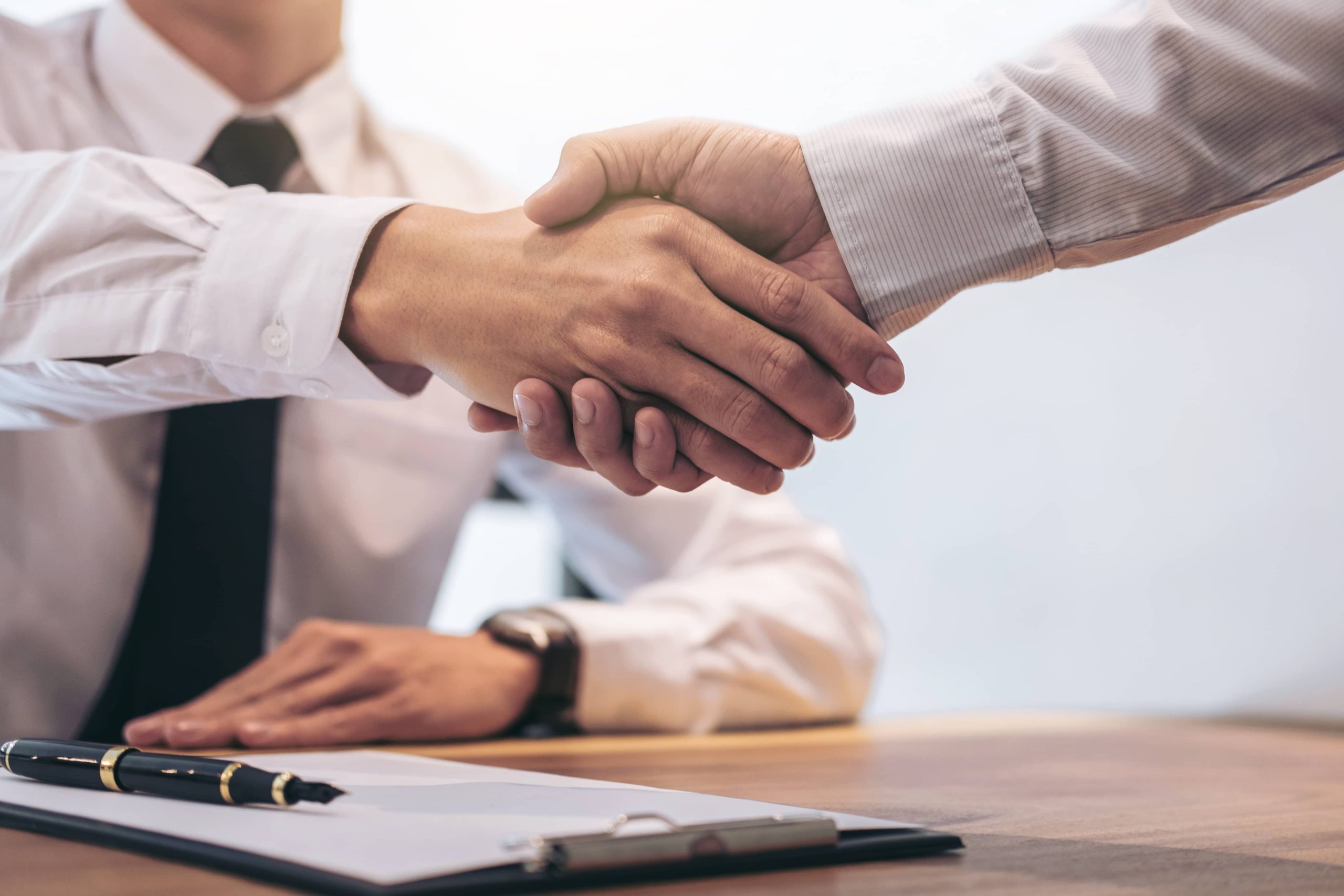 vecteezy_real-estate-broker-agent-and-customer-shaking-hands_1236440
